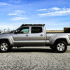 2nd gen Toyota Tacoma with a roof rack for l'overlanding