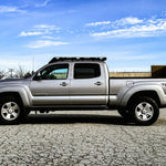 2nd gen Toyota Tacoma with a roof rack for l'overlanding