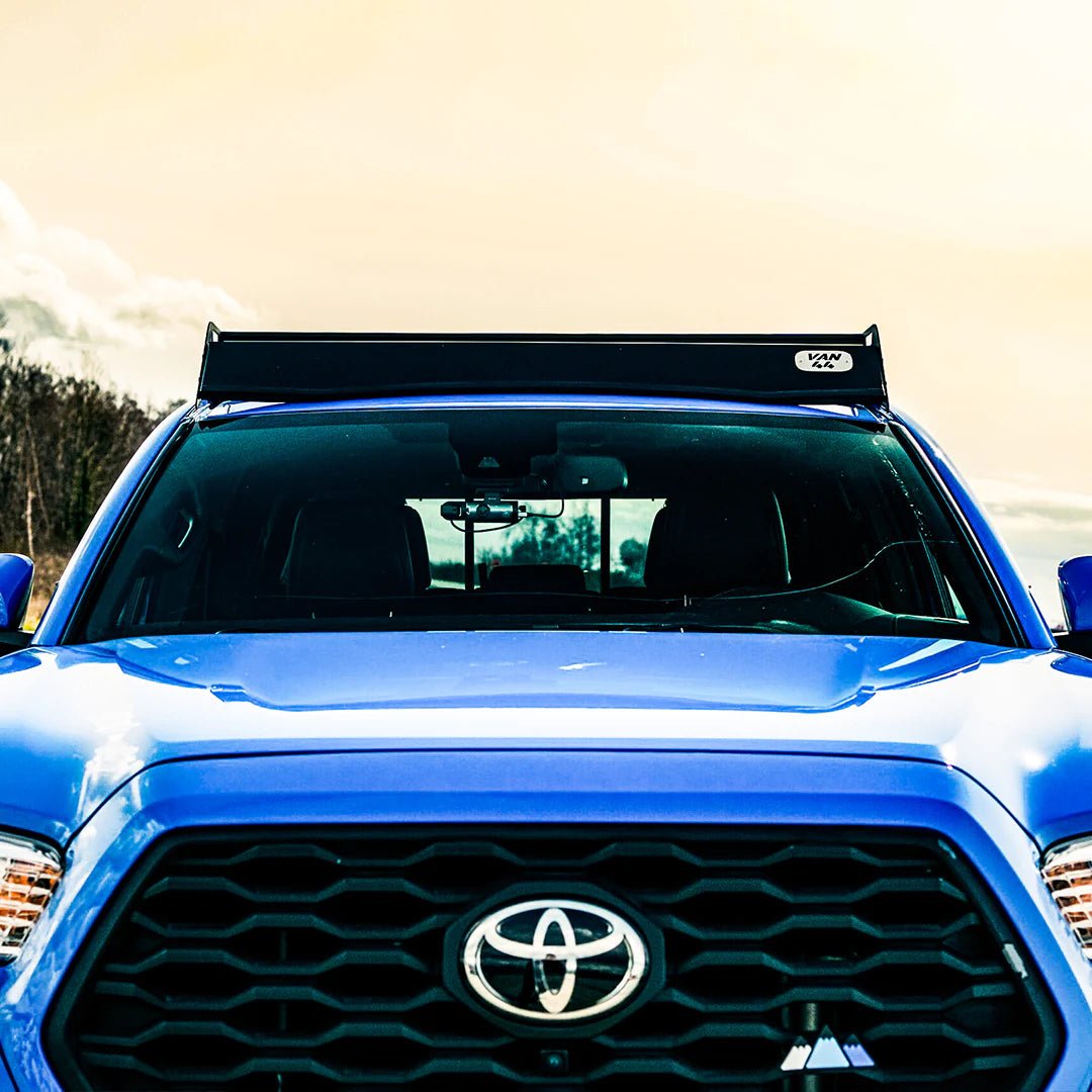 Front view of the Blue Toyota tacoma 3rd gen with a VAN44 Roof Rack