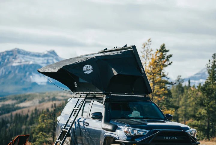 Front view of the 4 season roof top tent on a toyota 4runner in canada