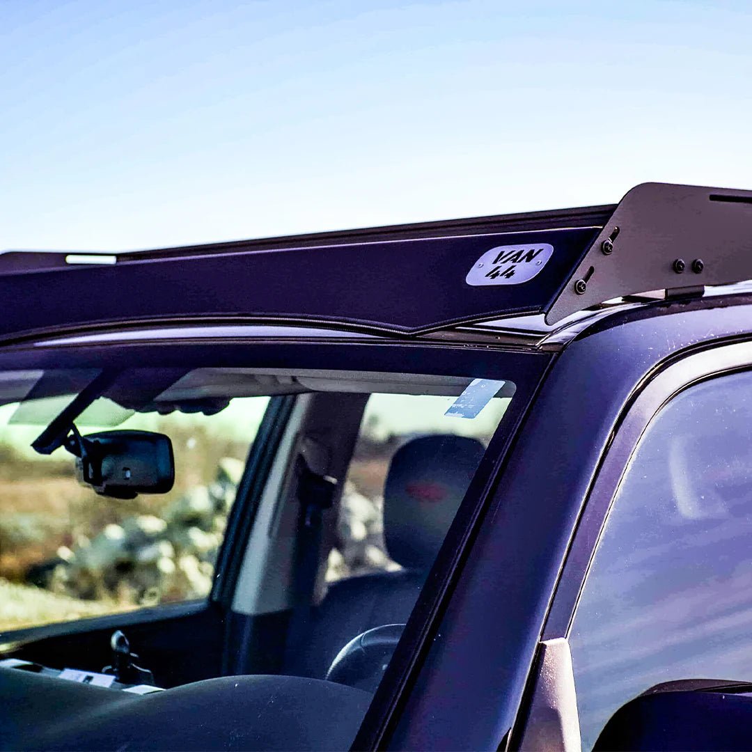Detailed view of the VAN44 logo on the roof rack, mounted on a 4runner of the 5th gen