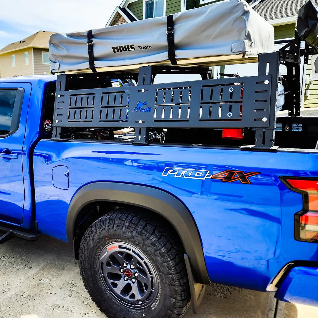 Side view of the adjustable truck rack with roof top tent