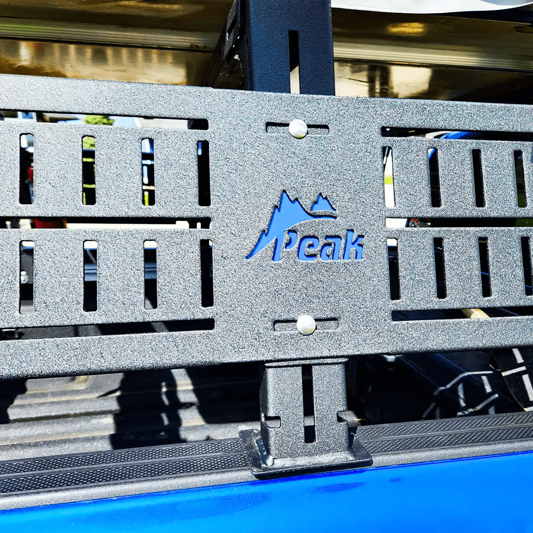 Detailed view of the Peak Logo of the truck bed rack