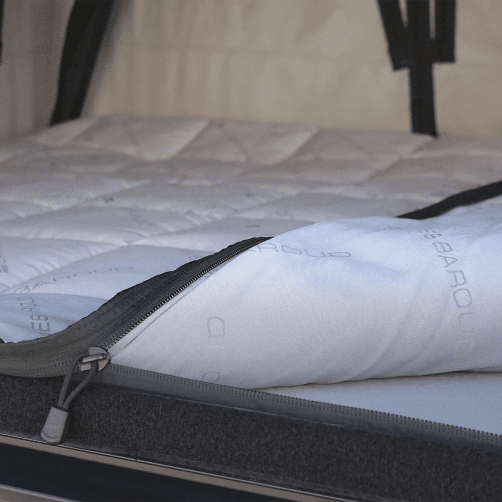 Opening the zip of the bedding system for roof top tent by james baroud