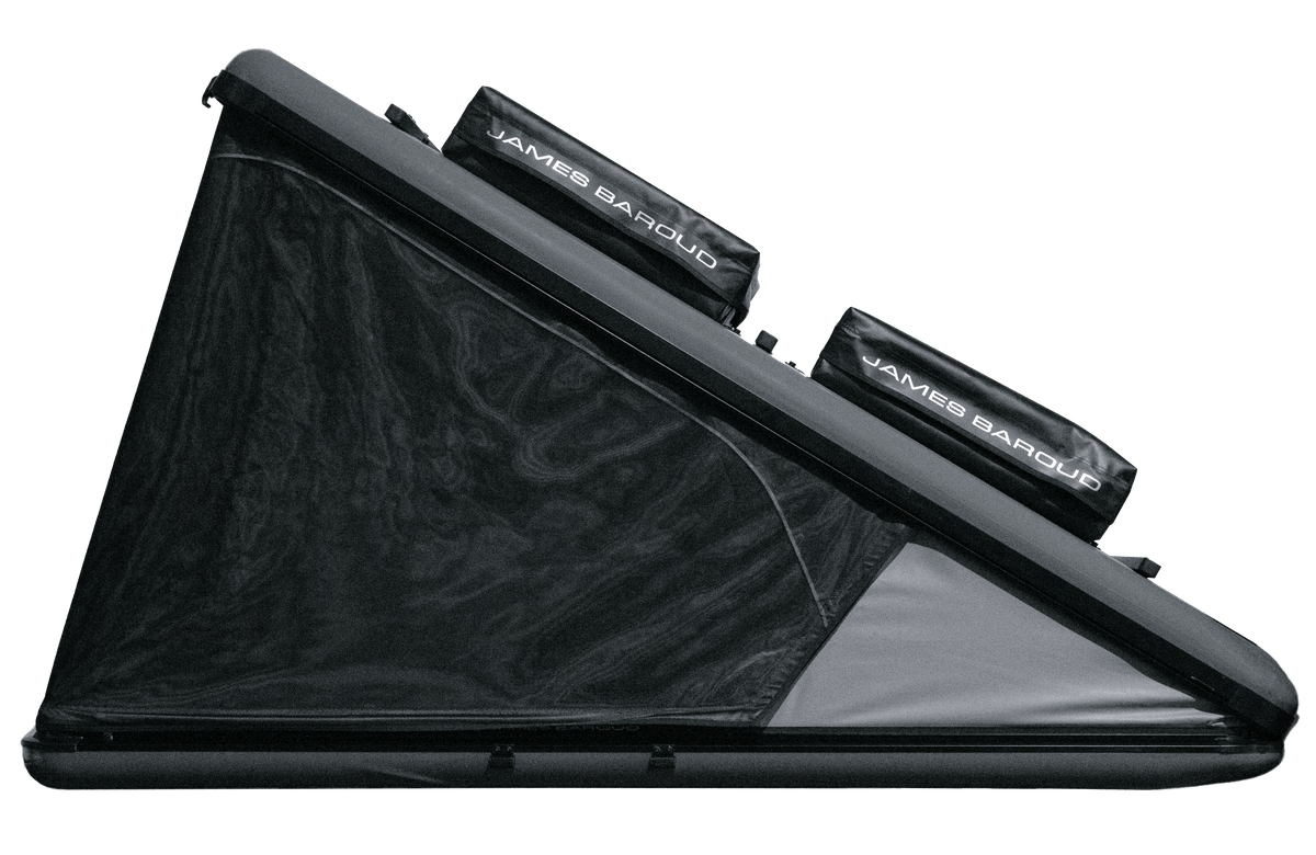Roof top tent with cargo on top and closed windows