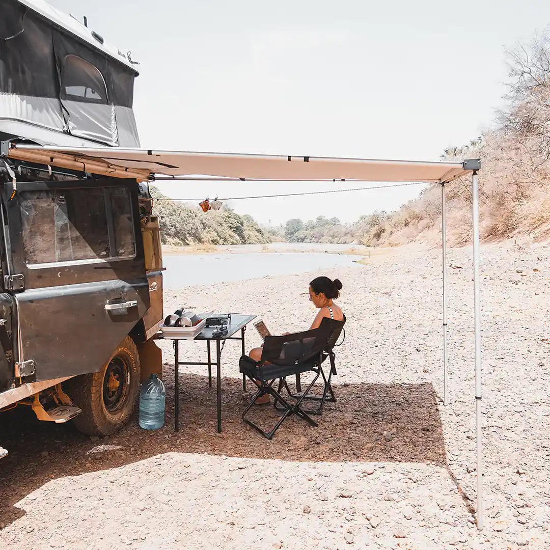 James Baroud Classic awning on the side of a river
