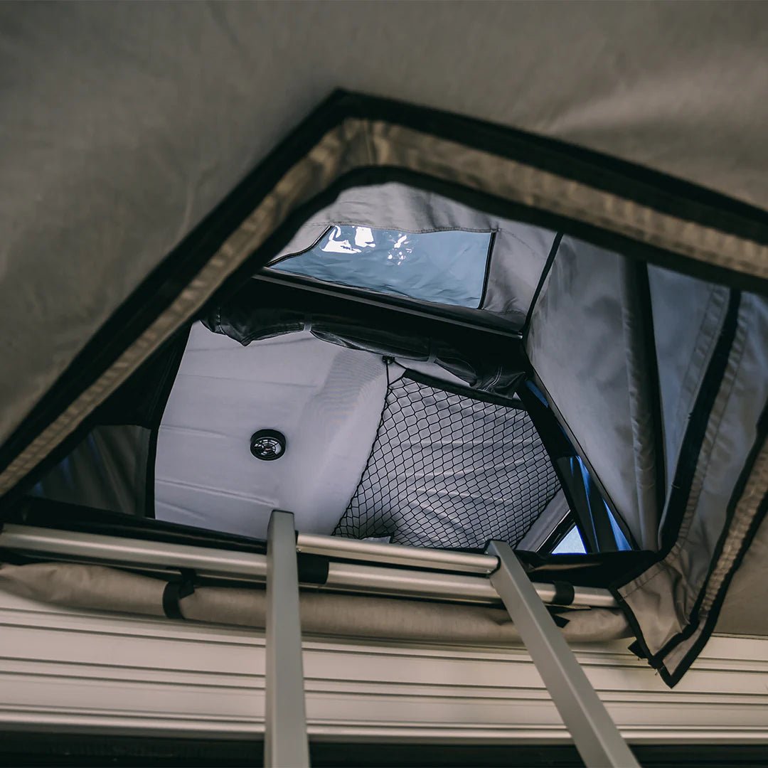 Hole in the awning going through the awning in the rooftop tent