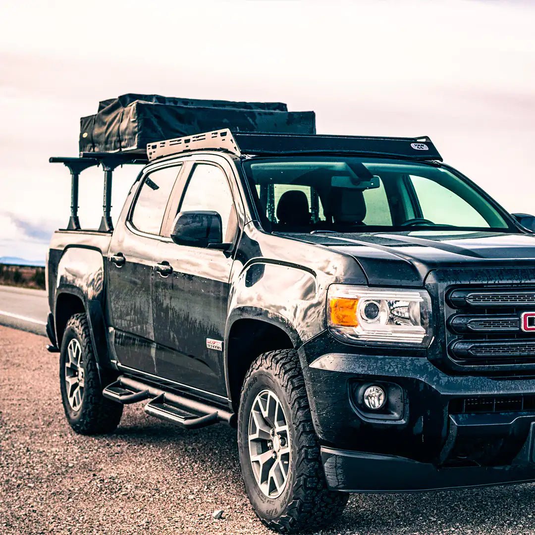 Side view and large viewof the overland setup on this GMC black truck