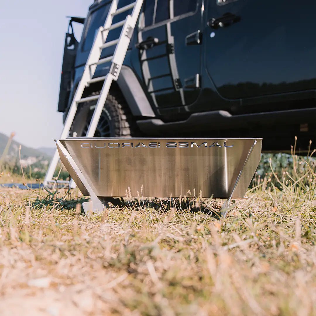 View on the side of a jeep with a rooftop tent
