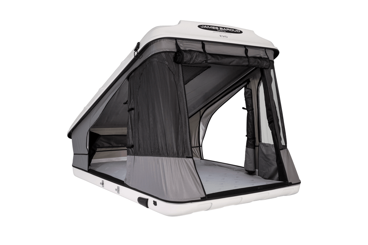 Clamshell Roof top tent with windows and doors open with view of the mattress
