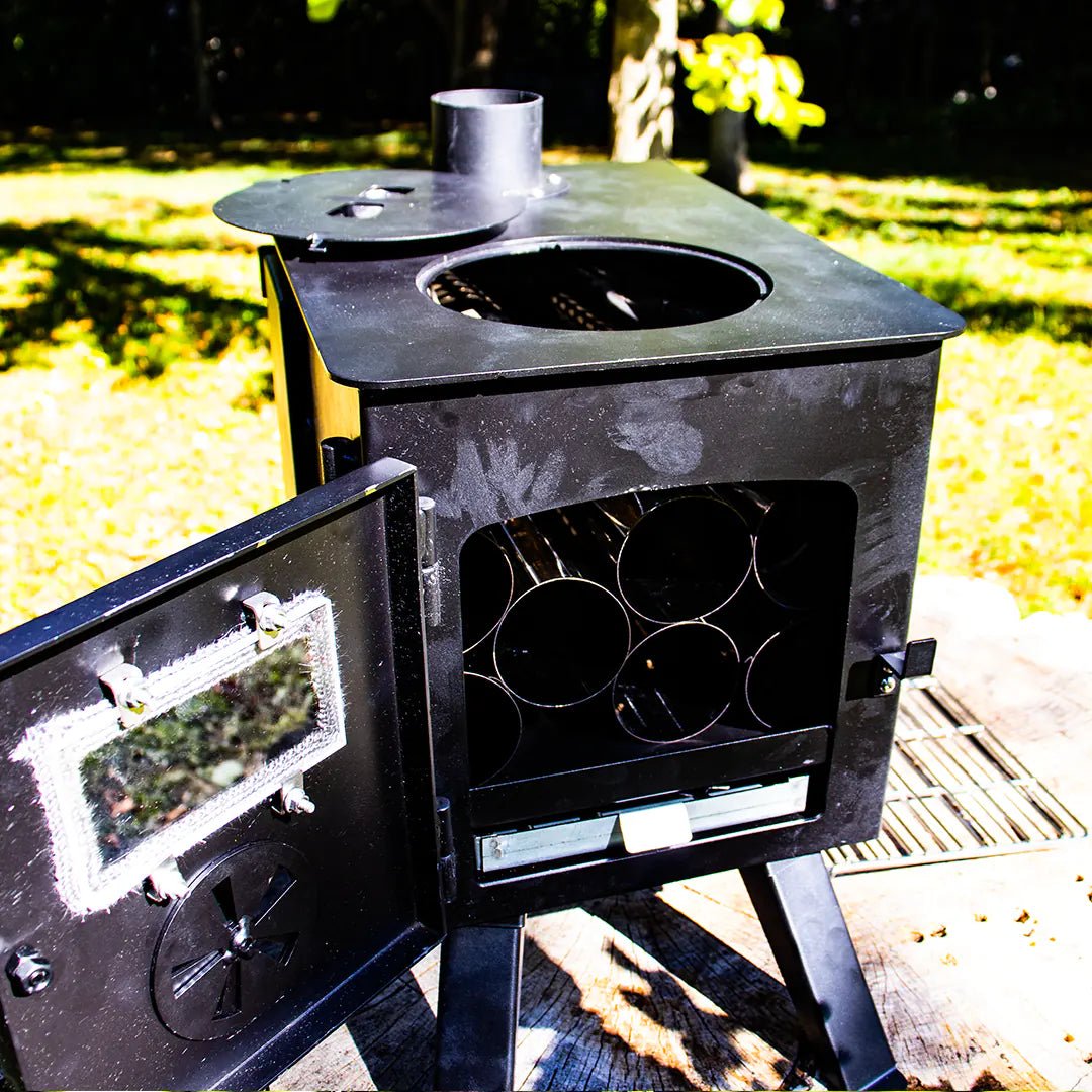 Front view with pipes inside, Tiny wood stove easy to move in van or camping