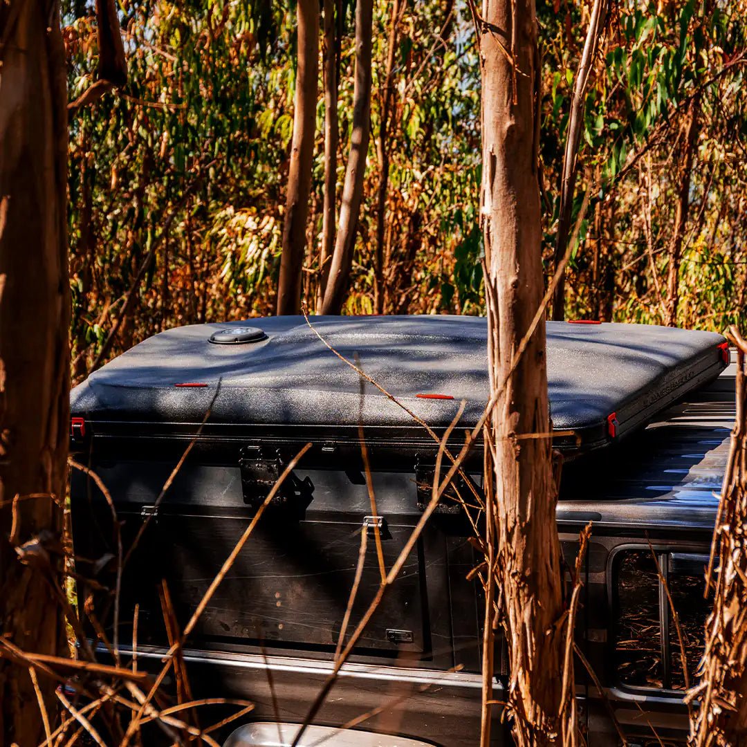 Large view of the High end pop up roof top tent in the forest