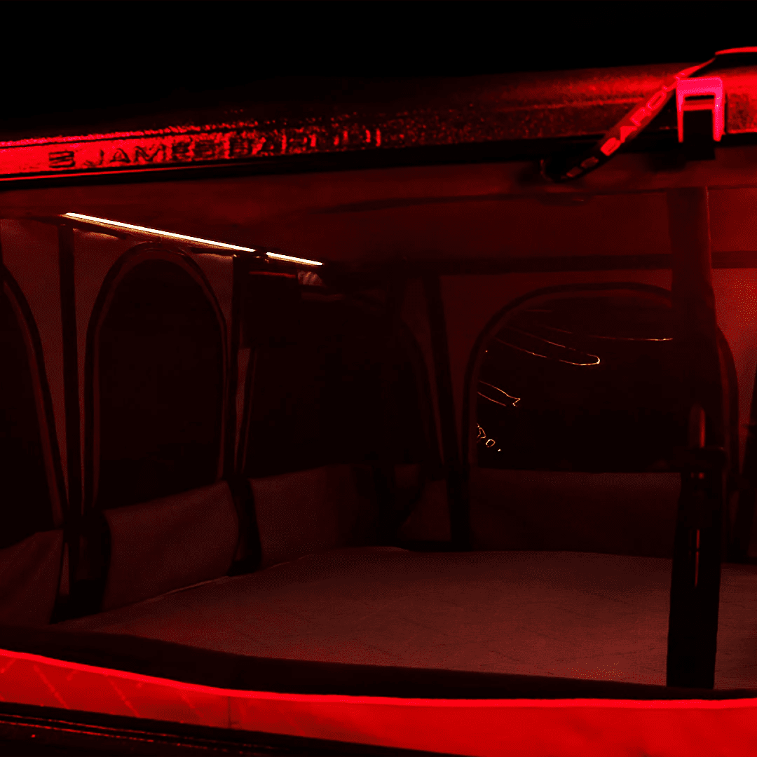 View of the James Baroud Magma Roof Top Tent with red light