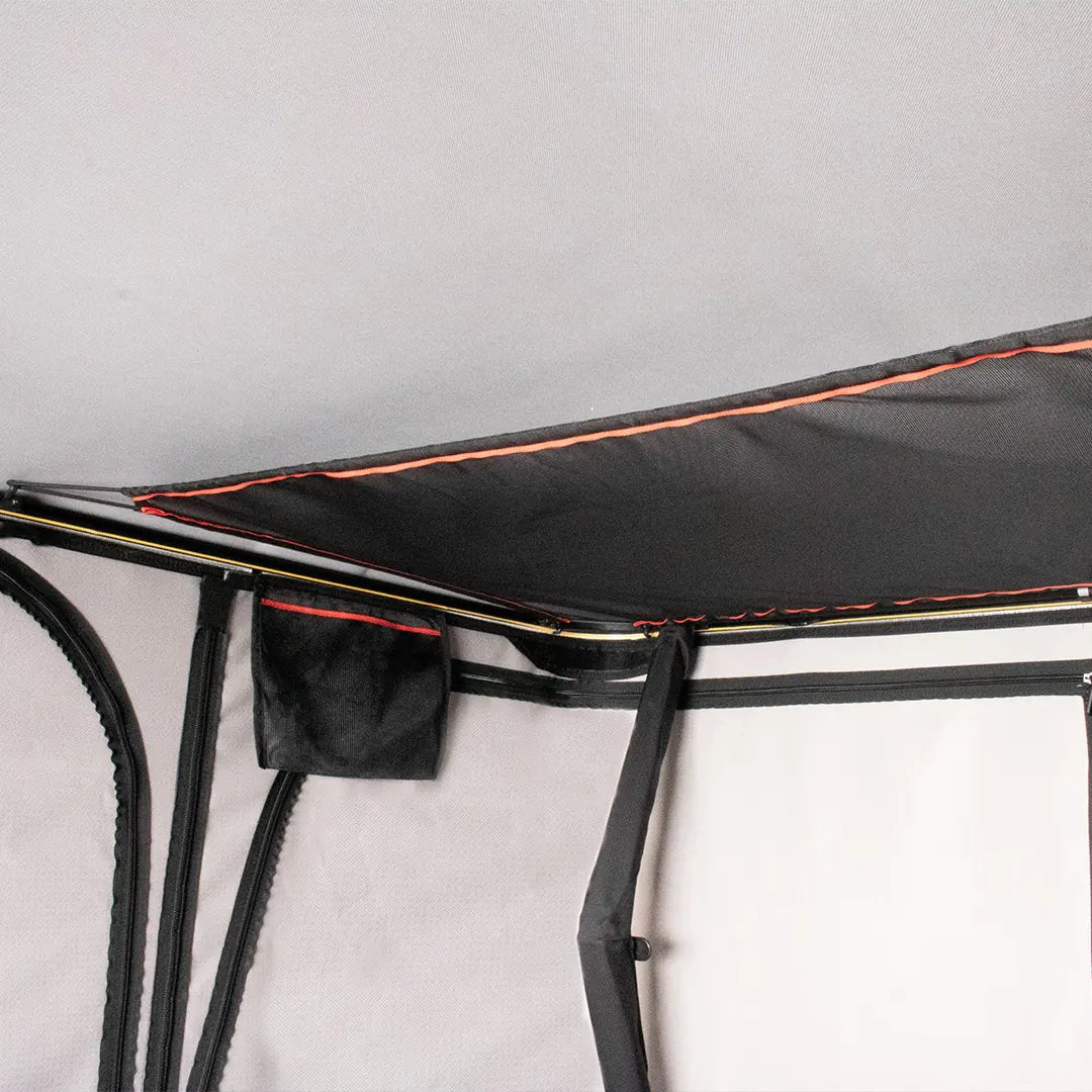 Inside view of the hard shell roof top tent with storage