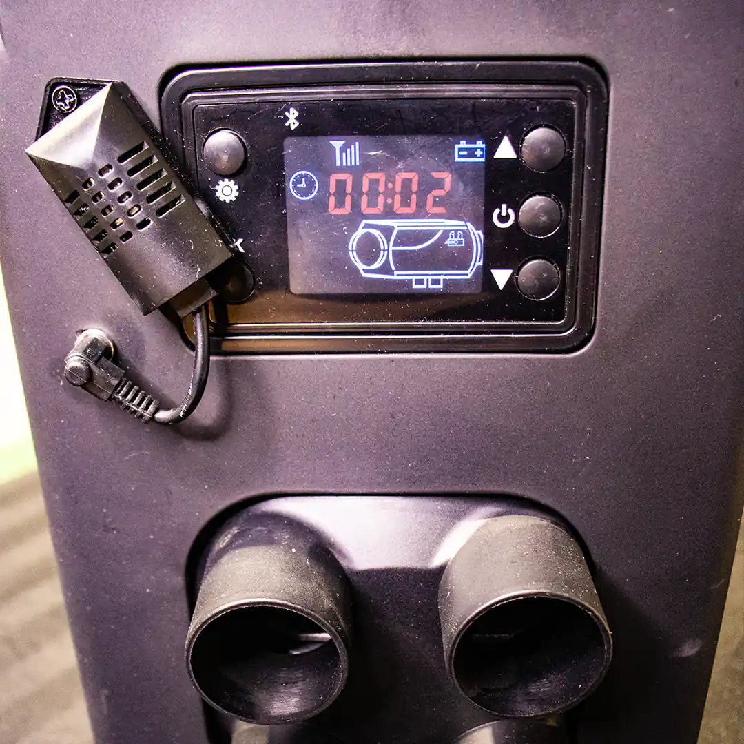 Portable Diesel Heater for Tent turned on with LCD screen and remote controller