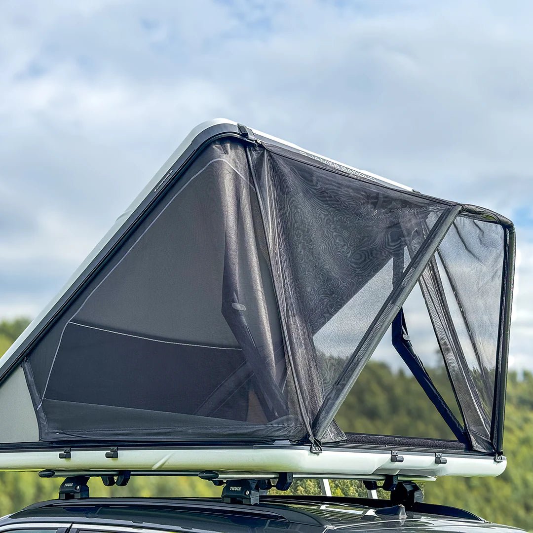 Rain shade for rooftop tent view from the rear on a Nova
