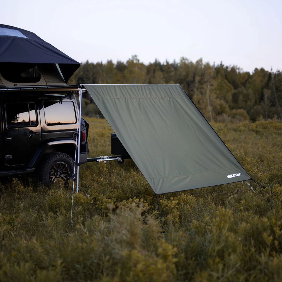 Sunset view of the camping extension wall for car awning